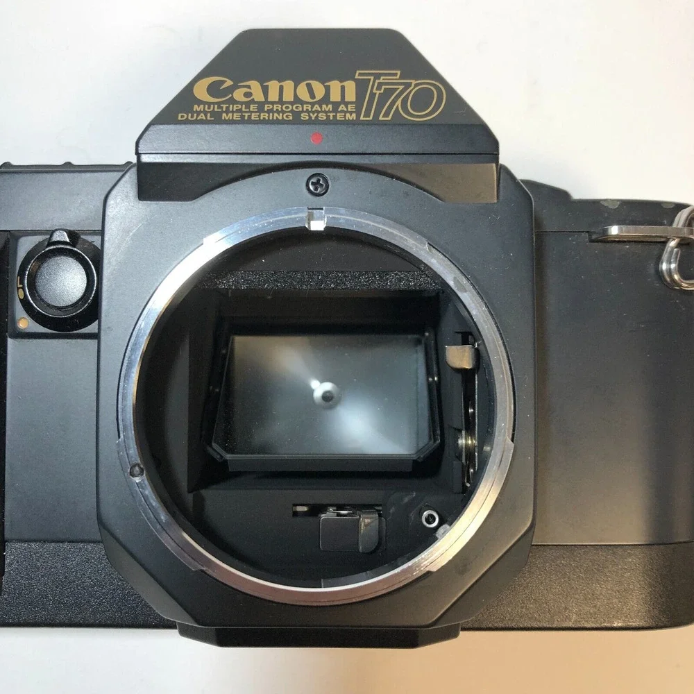 Canon T70 35mm Manual Focus SLR Camera Body Only Powers On Working